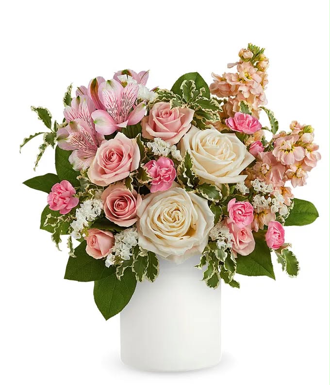 A beautiful handmade bouquet arrangement by Bouquetsscl featuring fresh pink roses and mixed blooms